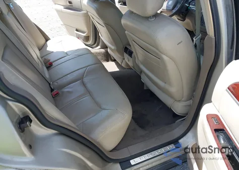 2004 Lincoln Town Car Ultimate из США, поврежденный, VIN 1LNHM83W14Y644745